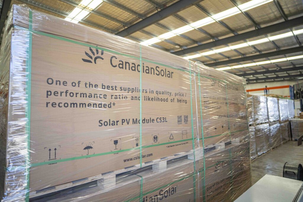 Pallet of Canadian solar panels stacked in Instyle Solar warehouse